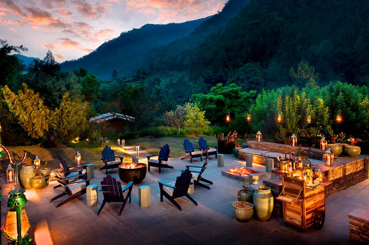 Punakha river lodge but o guest area fire pit