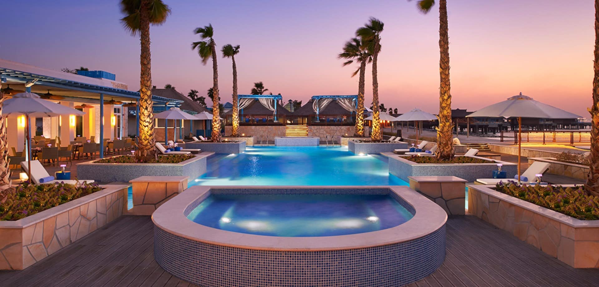 Banana island resort doha by anantara piscina por do sol