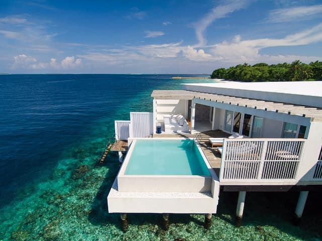 Amilla maldives reef water pool villa exterior