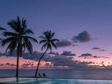 Beach pool sunset seychelles