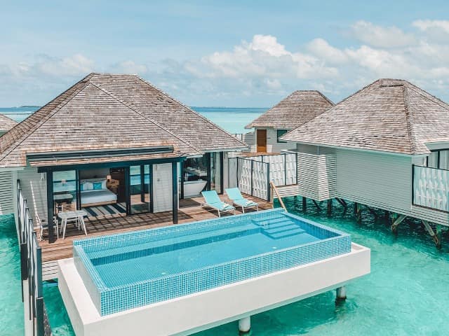 Nova maldives exterior water villa with pool