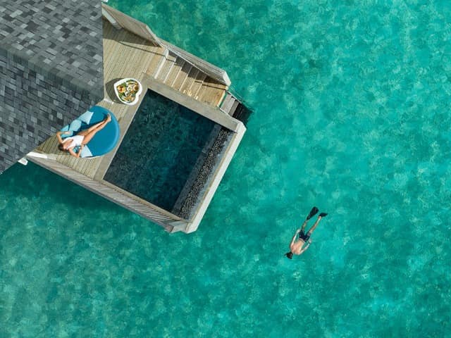 Water villa with pool aerial raaya by athosphere