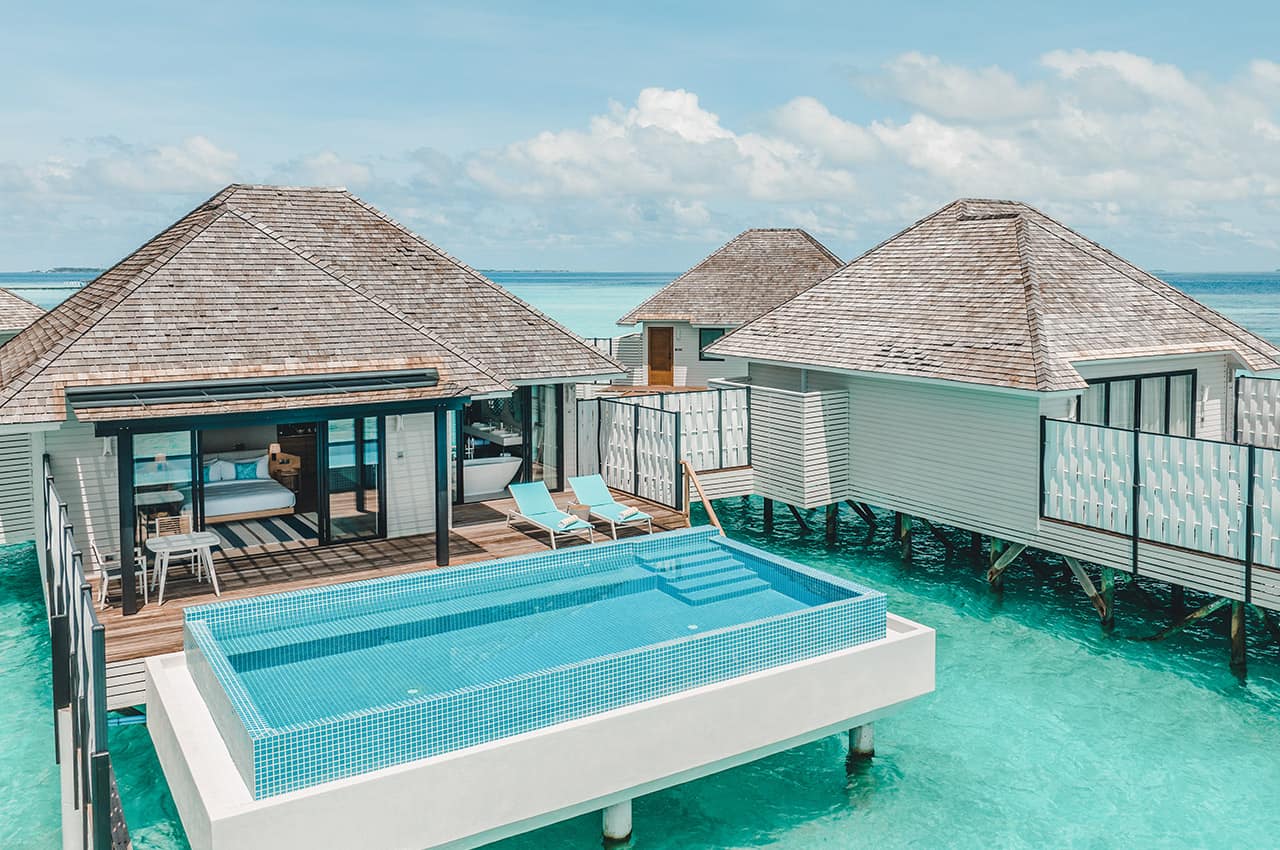 Nova maldives exterior water villa with pool