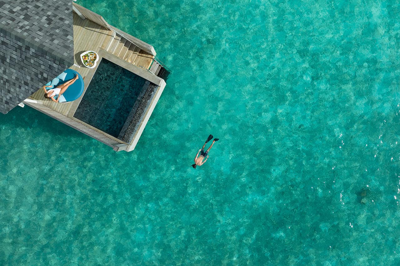 Water villa with pool aerial raaya by athosphere