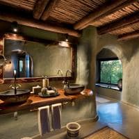 Africadosul reserva phinda andbeyond phindarocklodge suite banheiro