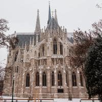 The outside of the votive church in vienna during the day in the winter