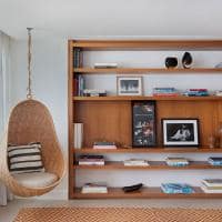Janeiro hotel suite janeiro area de descanso com estante de livros