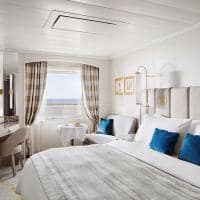 Crystal cruises double guest room with ocean view quarto