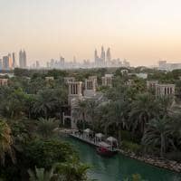 Jumeirah dar al masyaf sunset view over waterway