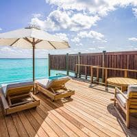 Conrad maldives deck sunset water villa with pool