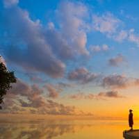 Dusit thani maldives pool sunset