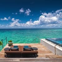 Maldivas velaa private island sunrise water pool villa deck