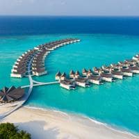 Movenpick resort kuredhivaru maldives bodumas overwater pool villas aerial