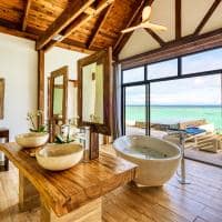 Movenpick resort kuredhivaru maldives overwater pool villas bathroom view