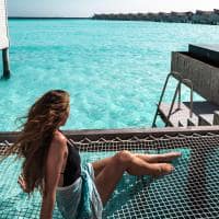Movenpick resort kuredhivaru maldives overwater pool villas hammock
