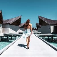 Movenpick resort kuredhivaru maldives overwater pool villas jetty