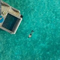 Water villa with pool aerial raaya by athosphere