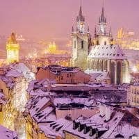 Winter in prague city panorama with tyn cathedral and clock tower prague czech republic