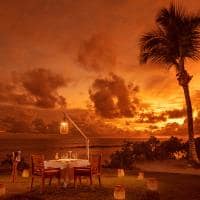 Anantara maia seychelles villas dining by design beach dusk